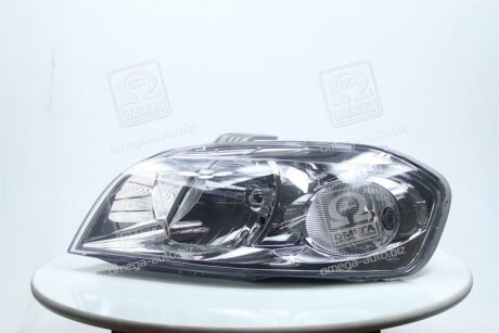 Фара левая с моторчиком Chevrolet Aveo T250 (06-) седан TYC 20B082A52B